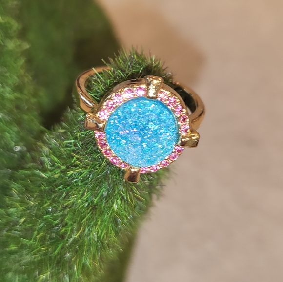 A gold-plated brass ring adorned with colorful semiprecious stones. - Picture 11 of 11